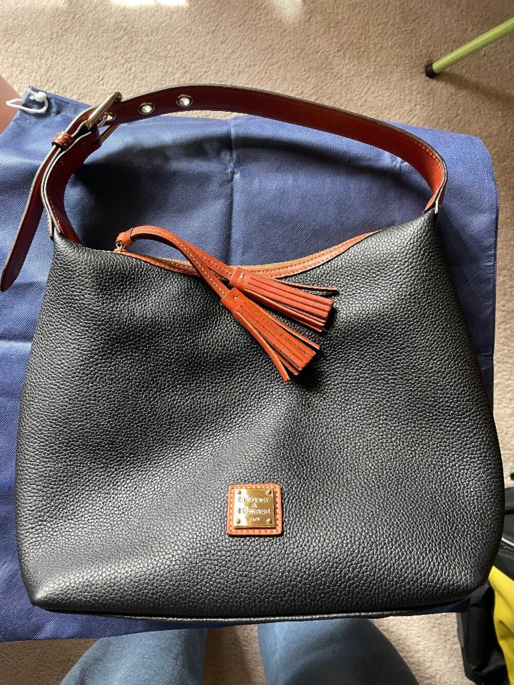 Dooney & Bourke large black/saddle handbag.